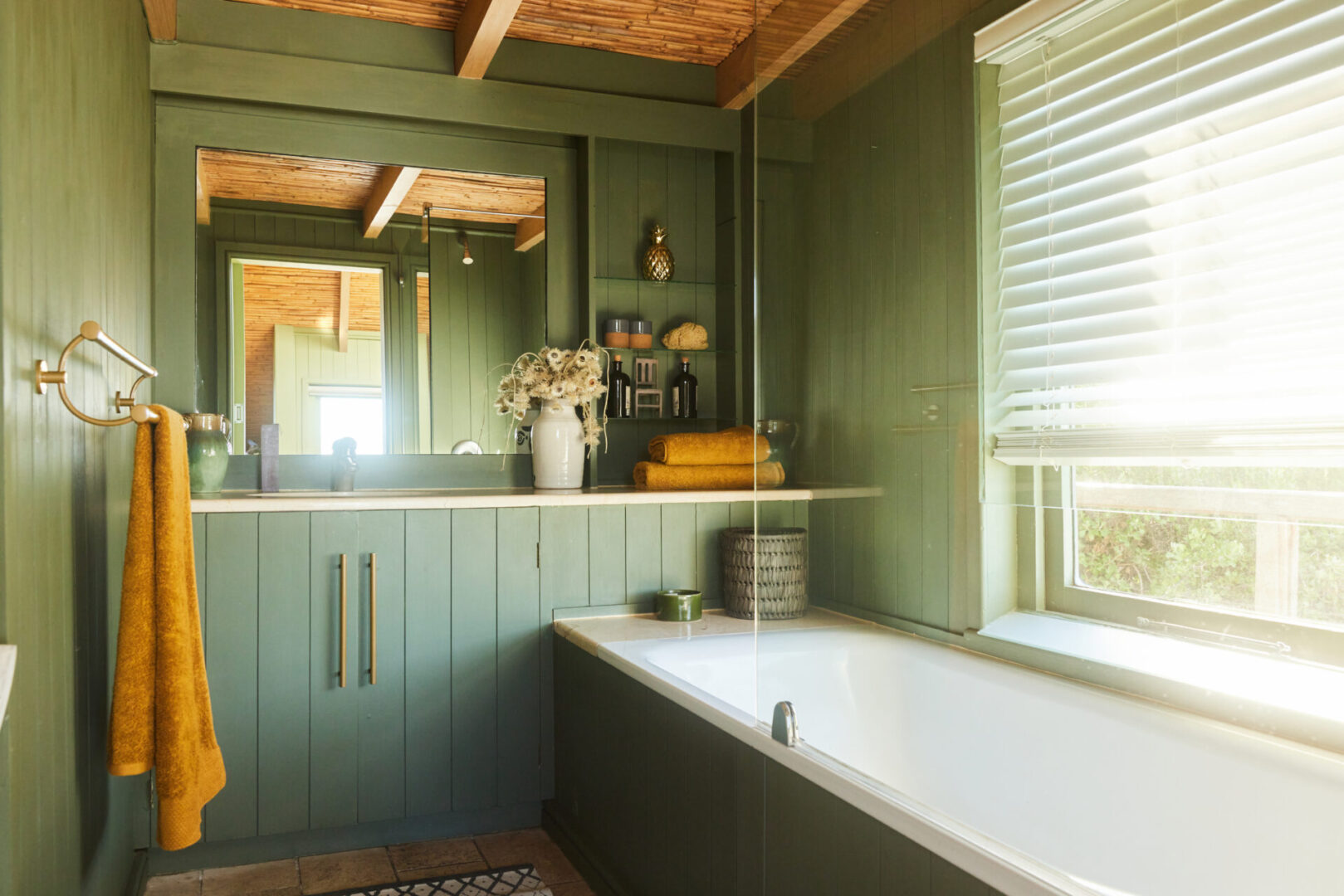 Cozy bathroom with wood accents and mirror