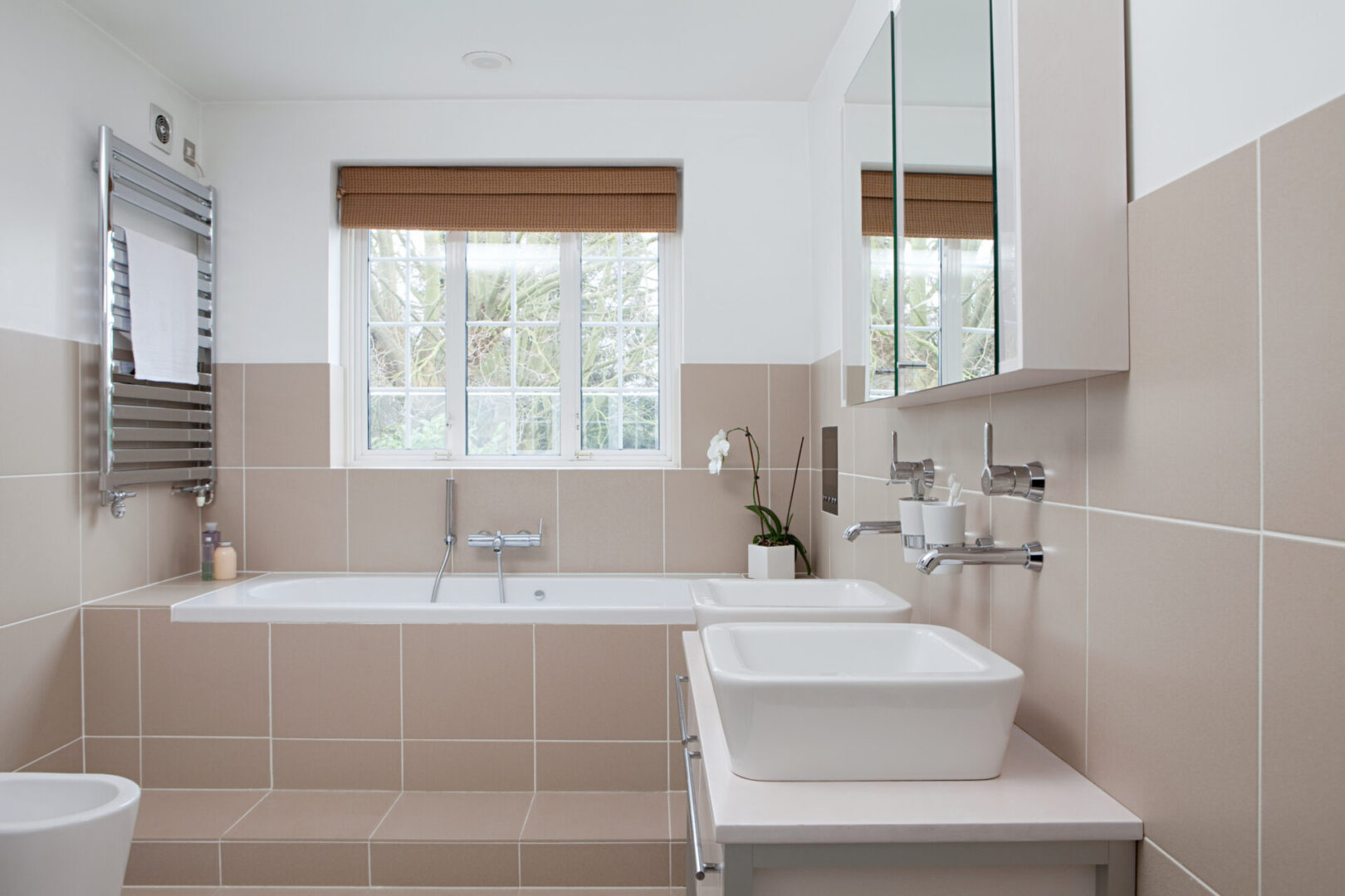 Bright bathroom with large window