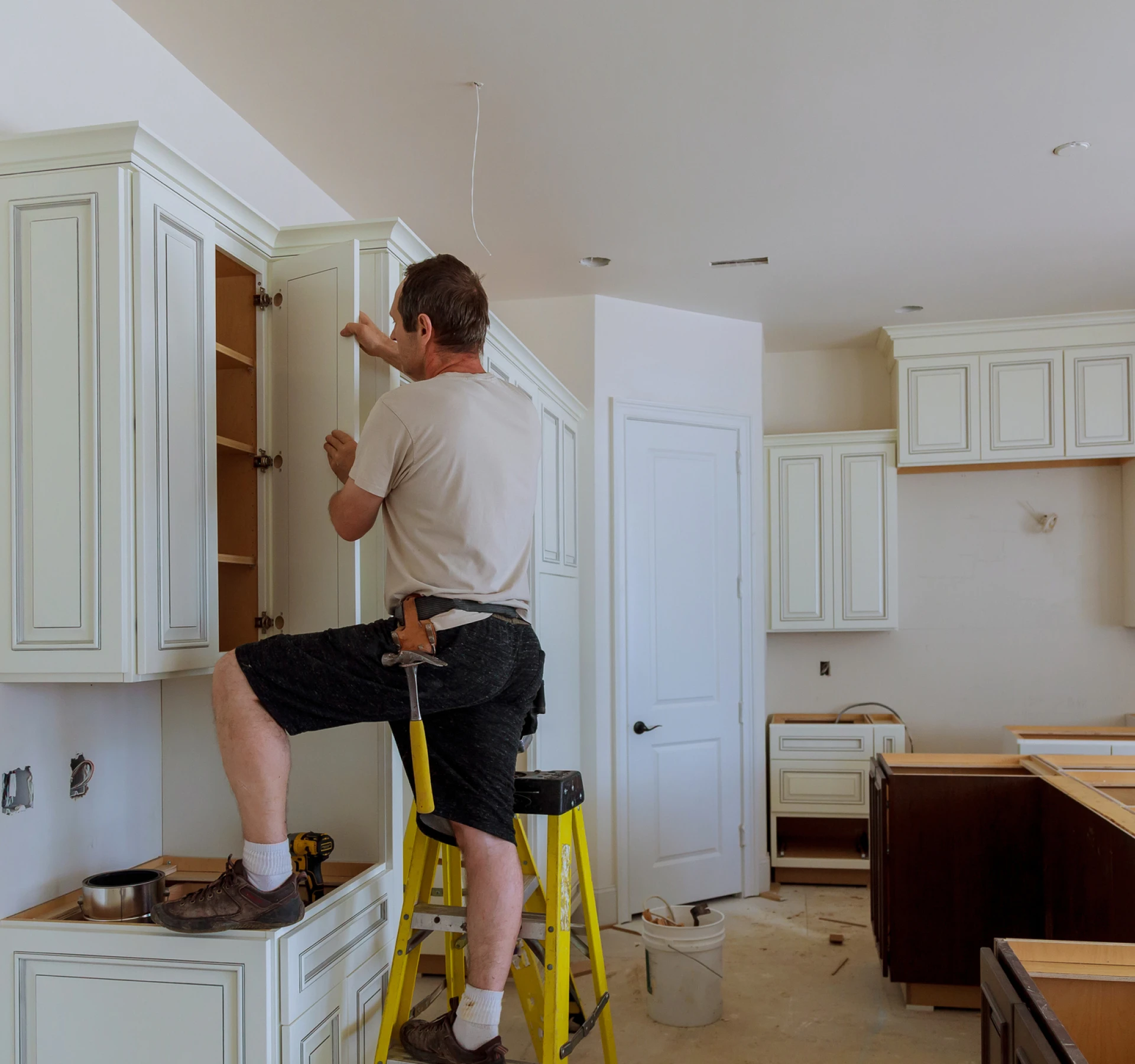 Carpenter working on kitchen renovation